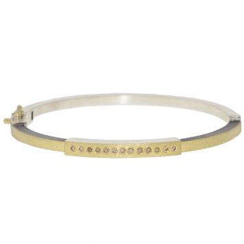Rene Escobar: DIANA LUX 2.5MM SS hinged bangle featuring an 18k YG push button style clasp and 18k YG top sheet set with 0.40CT Champagne Diamonds