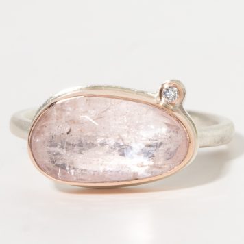 Jamie Joseph:Sterling & 14K Rose Gold Ring w/ Small Asymmetrical Morganite with .025 Satellite Diamond on Sand Band